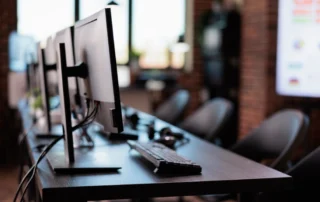 Office computer workstations illustrating the Talos Fellowship Autumn 2026 applications announcement