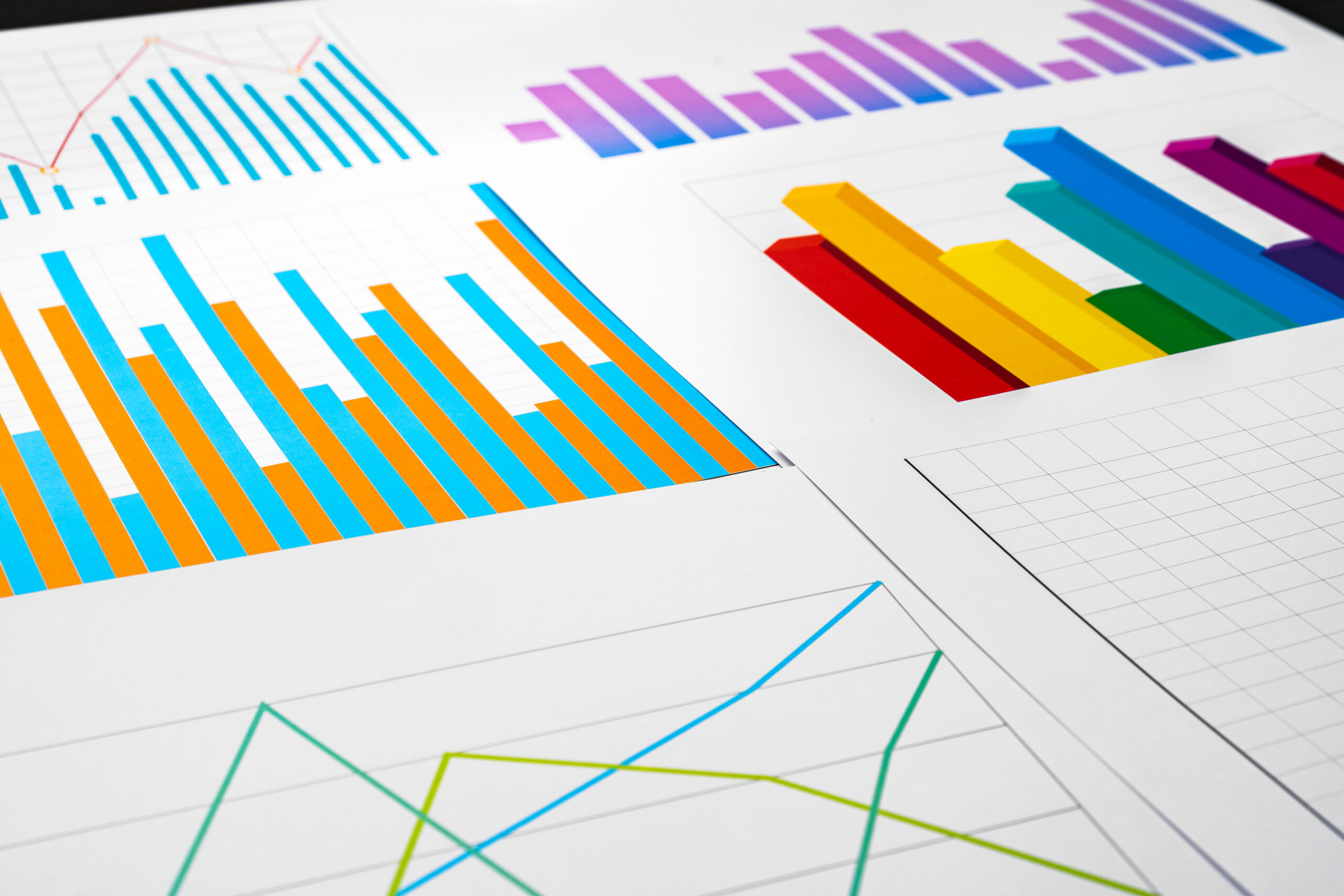 Charts and graphs illustrating AI benchmark tests and token comparisons
